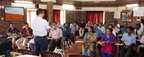 Kudumbashree Executive Director addressing the officers during the training program.
